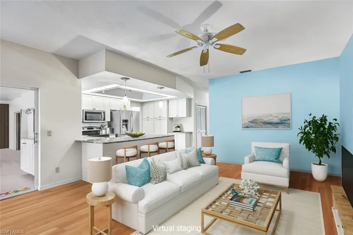 Staged Family Room. Pool Entry to left through sliding doors.