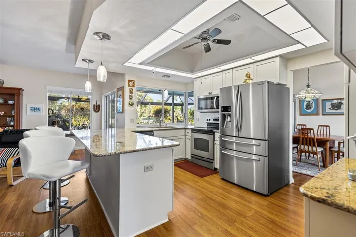 Updated Kitchen with granite and stainless steel appl.