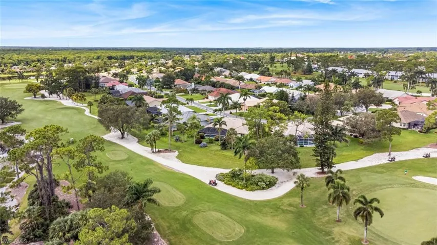 Home is situated between two golf holes of private course. Beautiful views!