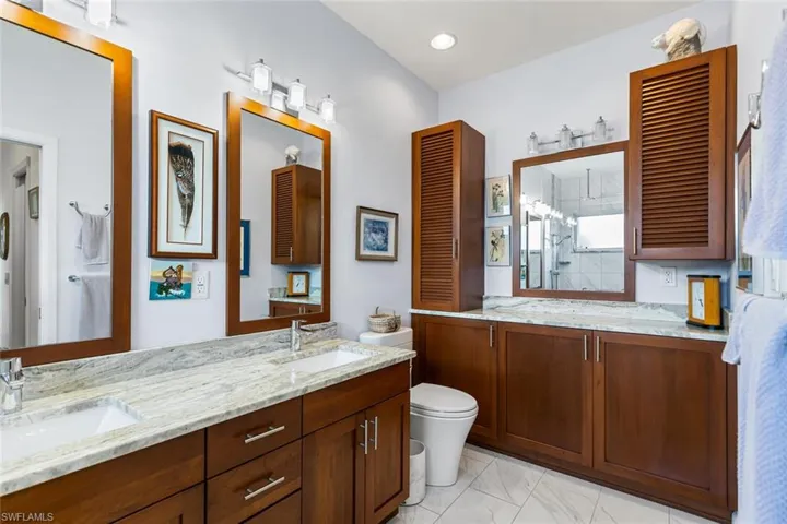 Custom double vanity and storage.