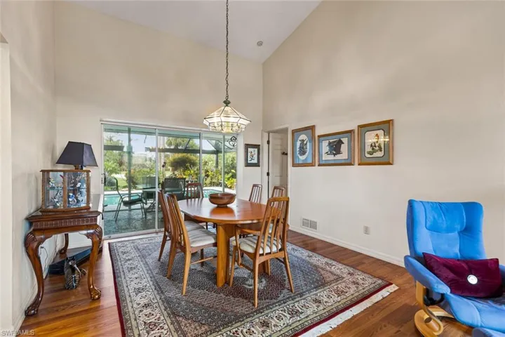 Dining Room off Living Room with opening on left to Kitchen. Door on right goes to Master Bedroom.