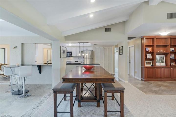 Foyer Bookcase, View into The Kitchen