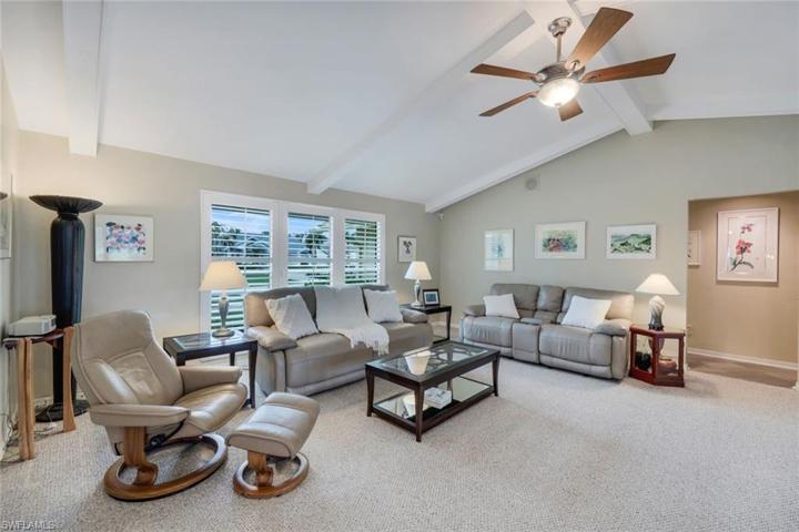 View II of Living Area, Volume Ceiling, Hurricane Rated Front Windows