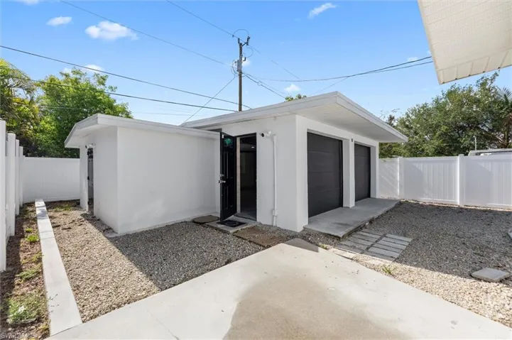 Air-conditioned 2-car garage with full kitchen and bath