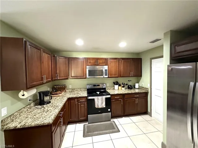 1407  Roosevelt  AVE, Lehigh Acres, FL 33972