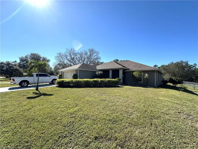 1407  Roosevelt  AVE, Lehigh Acres, FL 33972
