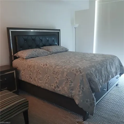 Bedroom with carpet