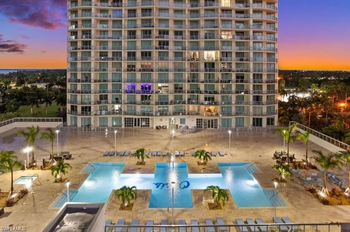 View of apartment building / complex with a community pool
