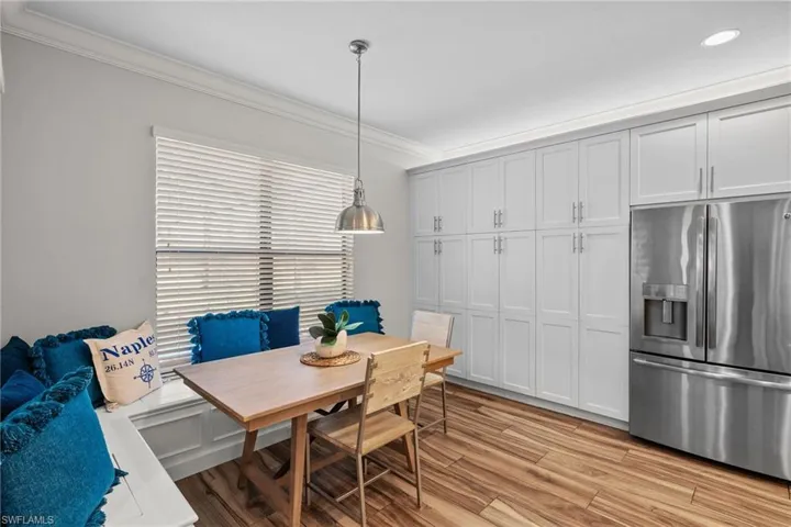 Large Cabinet Pantry with built in seating in breakfast area