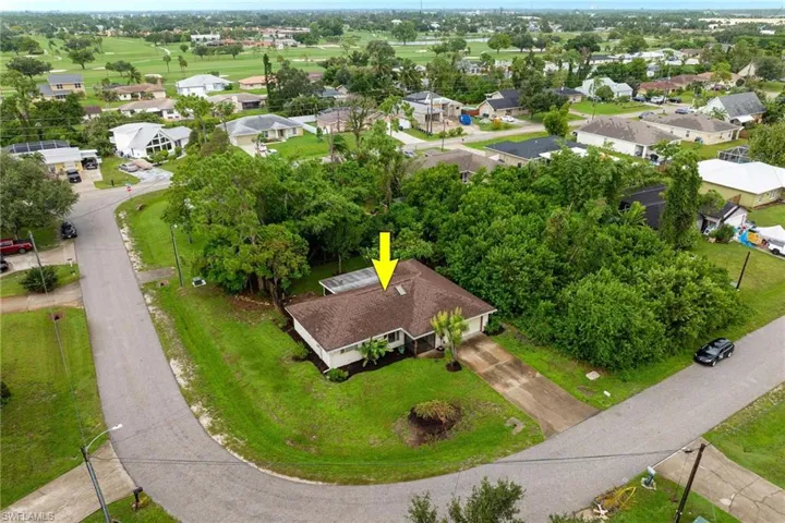 View of home on large corner lot