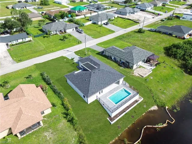 Aerial view of residential area with a pool