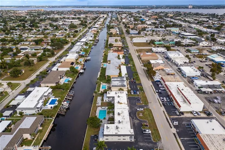 Aerial view of residential area with a large body of water