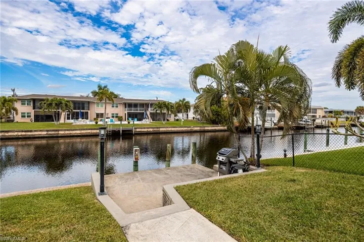 Water view featuring a dock