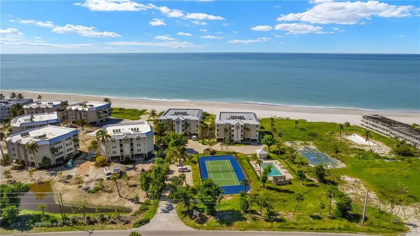 Bird's eye view featuring a view of the beach and a water view