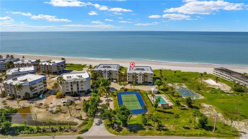 Bird's eye view featuring a view of the beach and a water view