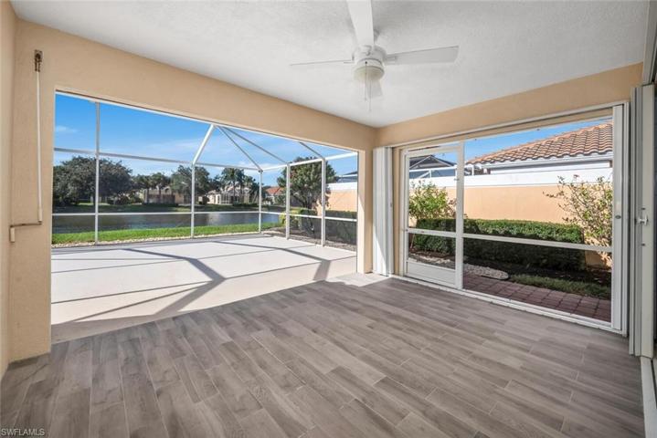 Covered lanai with newly tiled flooring.
