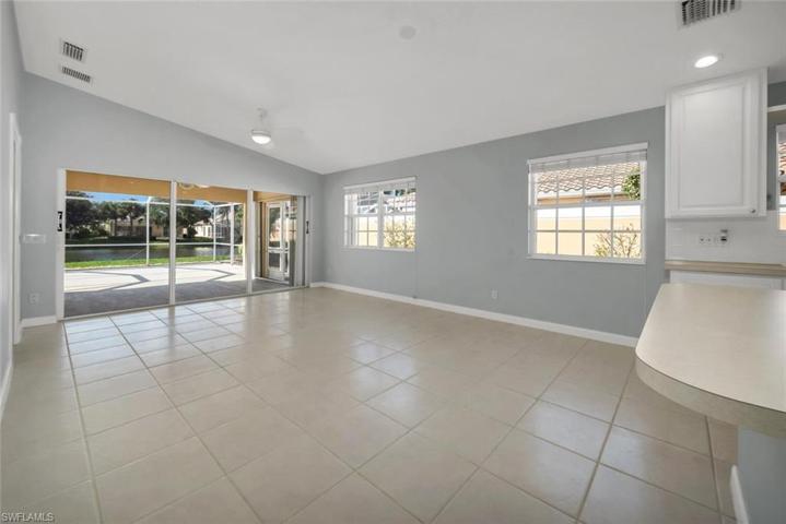 Family room/den space opens to kitchen & lanai