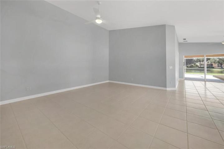 Large living room with vaulted ceiling.