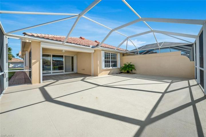Sunny patio compliments the covered lanai.