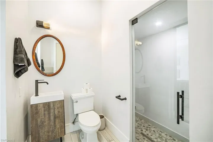 Full bath featuring vanity and a steam shower