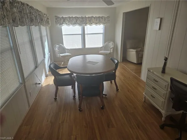 Dining room with hardwood / wood-style floors