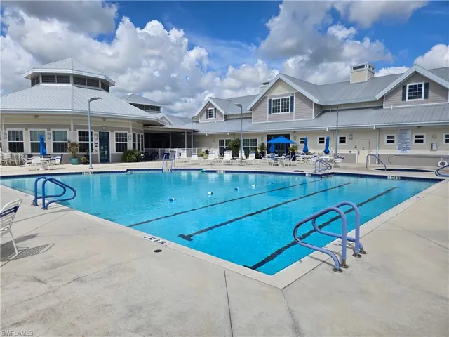 View of swimming pool featuring a patio