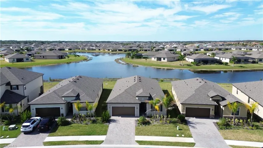 Aerial view of residential area with a nearby body of water