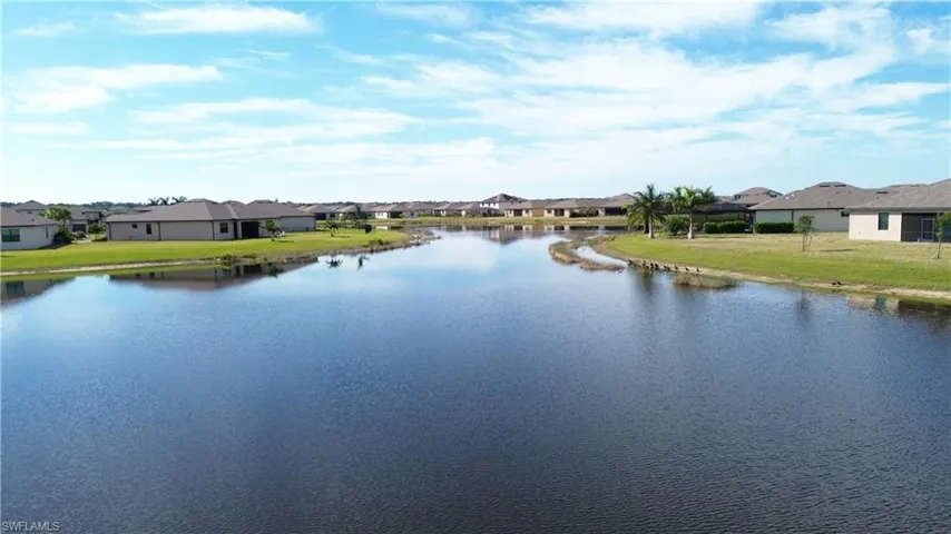 Water view featuring nearby suburban area
