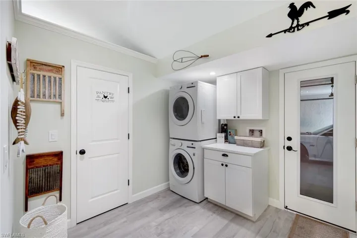 Laundry room with pantry