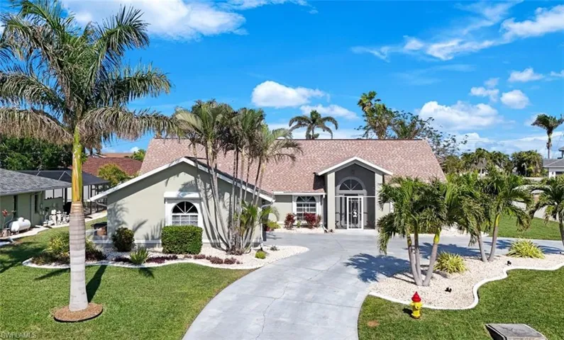 Front of house with circle driveway