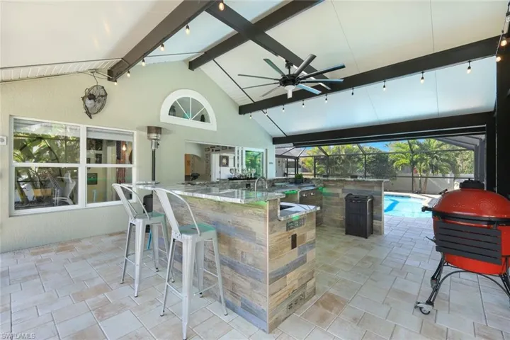 Lanai with outdoor kitchen