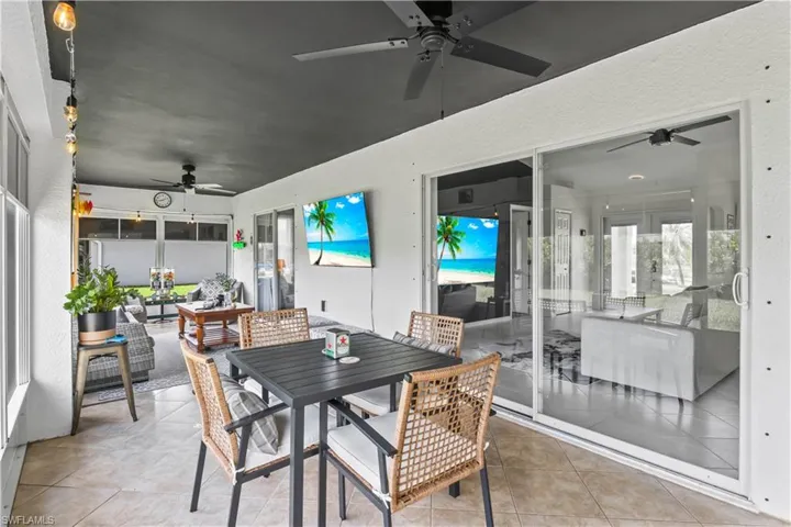 Sunroom featuring tile patterned floors
