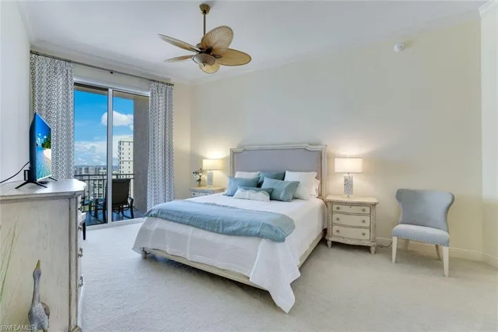 Bedroom with crown molding, carpet, baseboards, access to outside, and ceiling fan