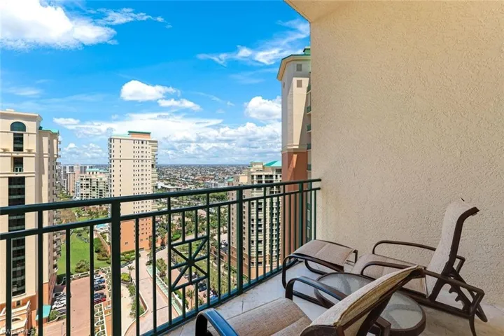 Balcony featuring a view of city