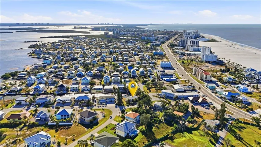 View of urban area with expansive beach - Virtually Edited Image