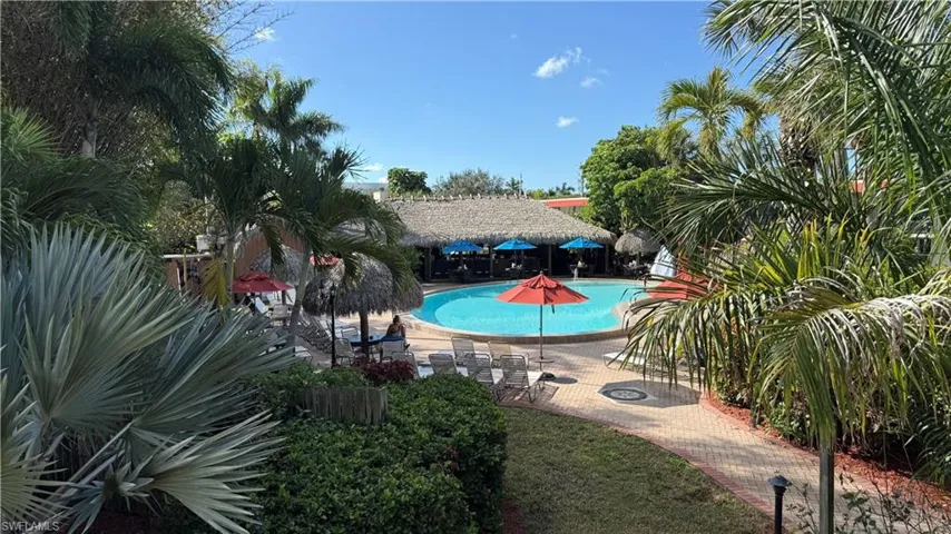 Community pool with a patio area