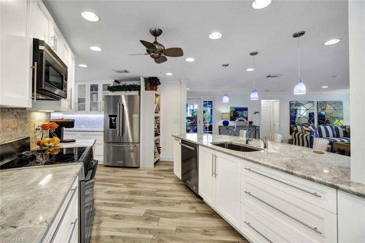 The kitchen has stainless steel appliances
