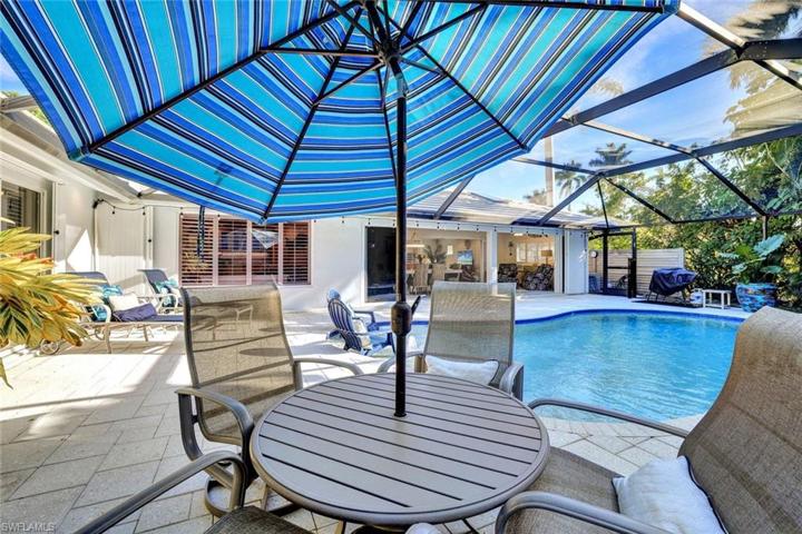 There is plenty of room to lounge and entertain by the pool