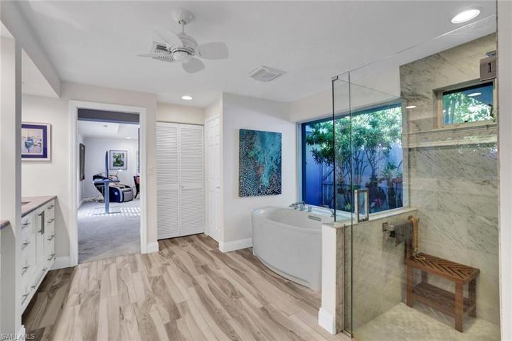The primary bath has a separate W/C behind the closed door