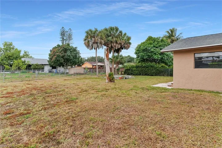 View of fenced backyard