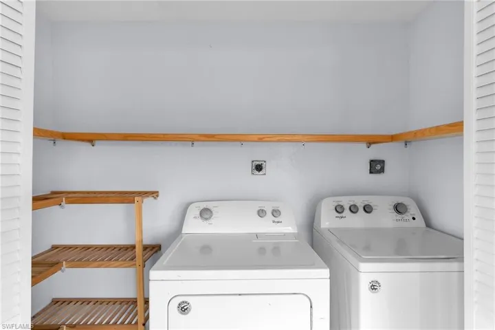 Laundry area featuring separate washer and dryer