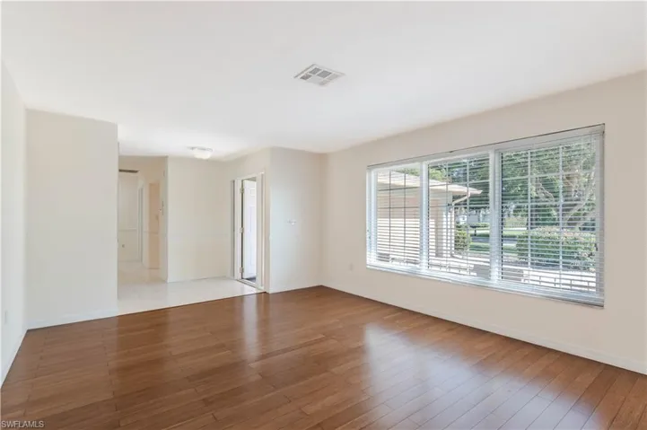 Unfurnished room featuring light wood-type flooring