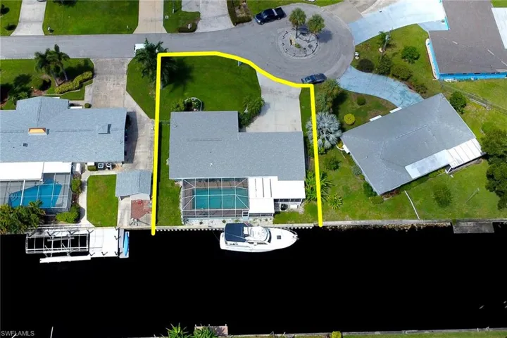 Aerial view of property's location with property parcel outlined