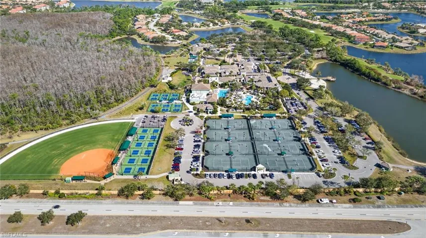 Aerial overview of property's location with a large body of water