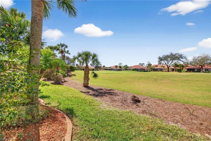 View of grassy yard featuring a residential view