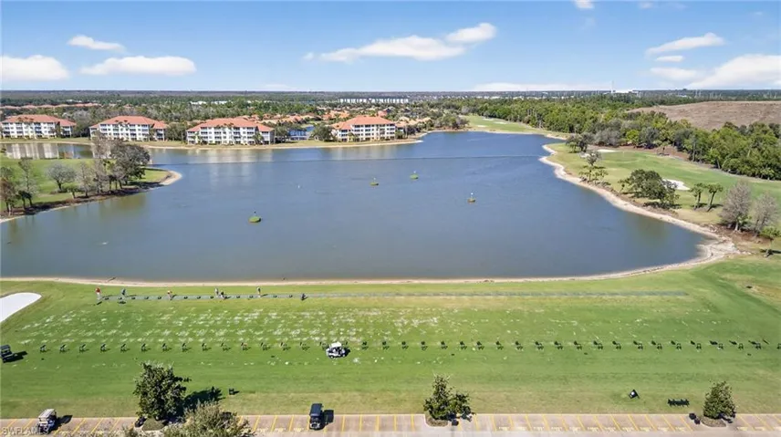 Bird's eye view of a large body of water and a local golf course