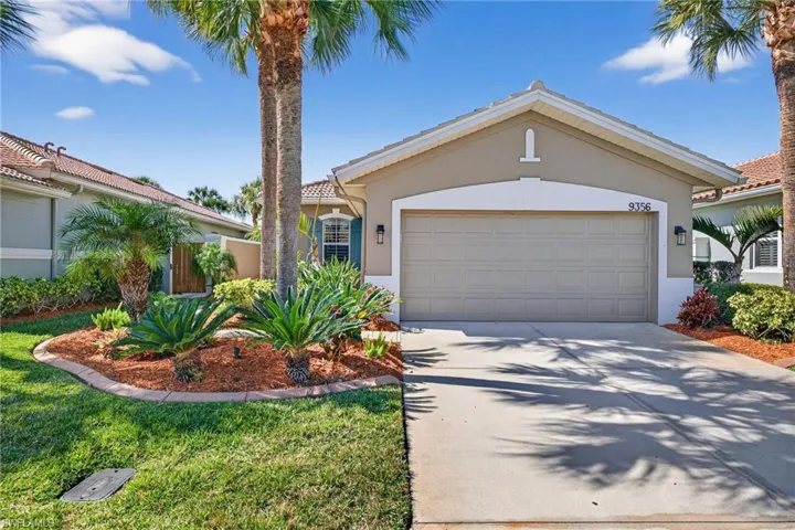 Mediterranean / spanish-style house featuring a garage, stucco siding, concrete driveway, and a front yard