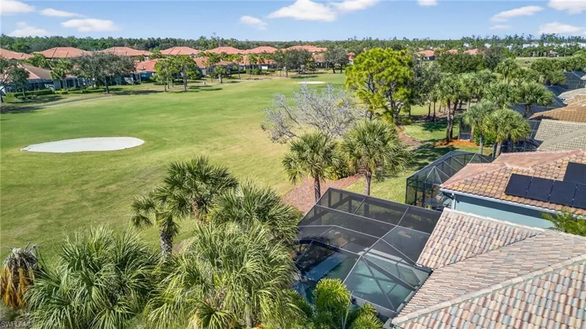 Aerial view of residential area with a golf course