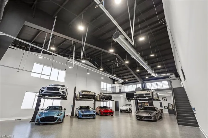 Garage featuring baseboards