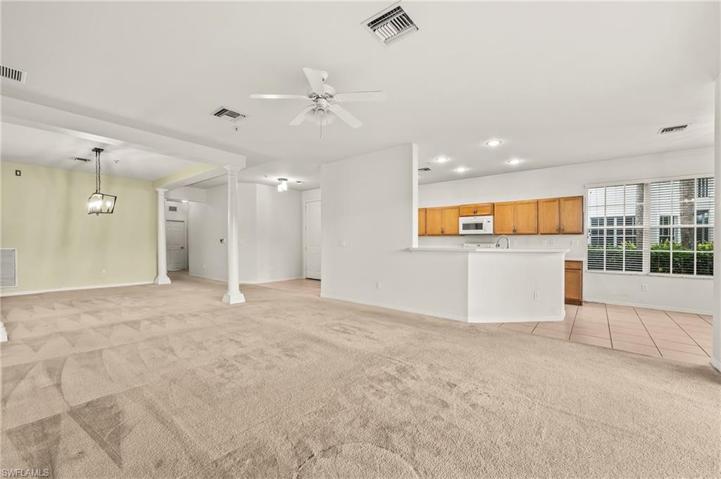 Living room to lanai and kitchen